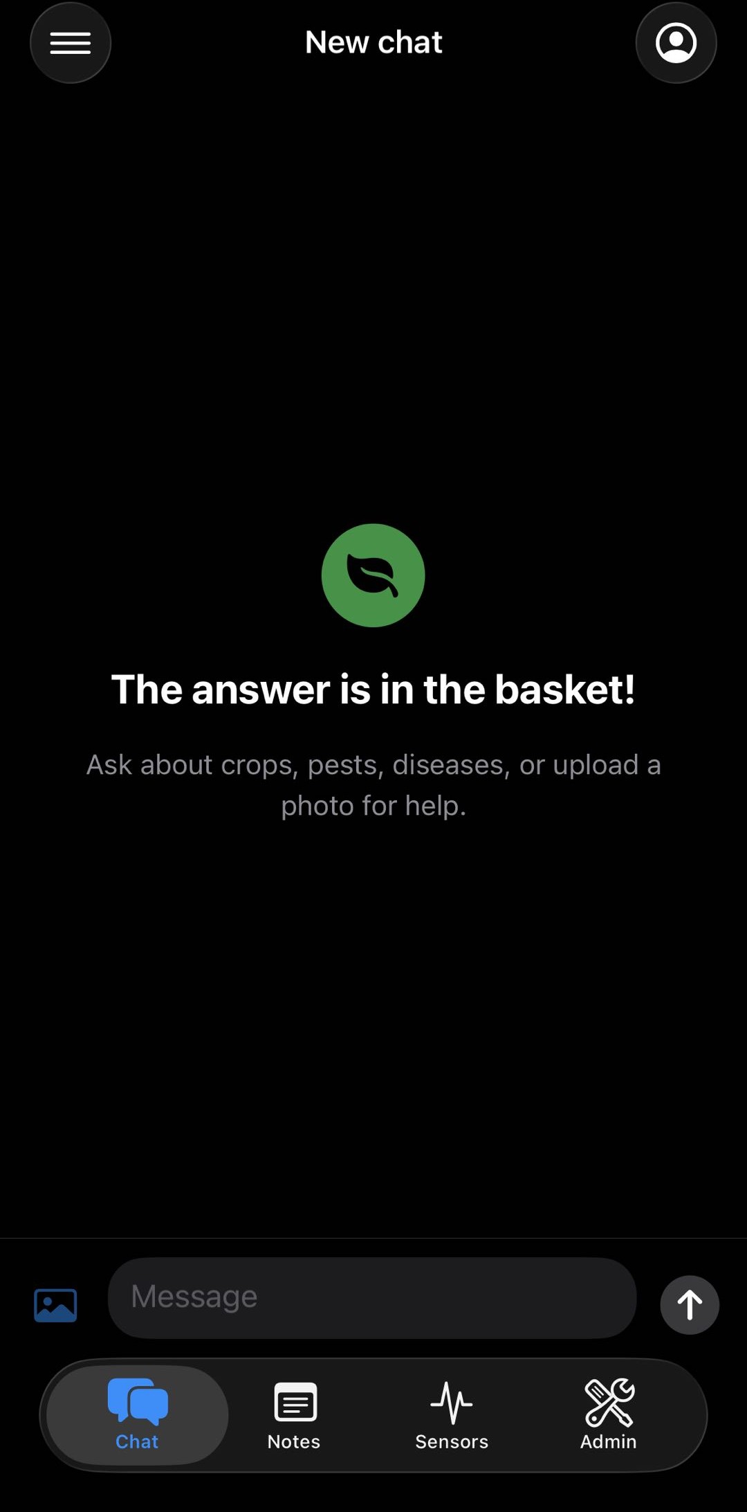 The app's chat screen: The answer is in the basket. Ask about crops, pests, diseases, or upload a photo for help.